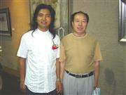 2006年6月11日李建民留俄作品展与吴为山合影