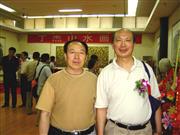 2006年6月10日丁杰画展开幕式与著名美术理论家左庄伟先生合影